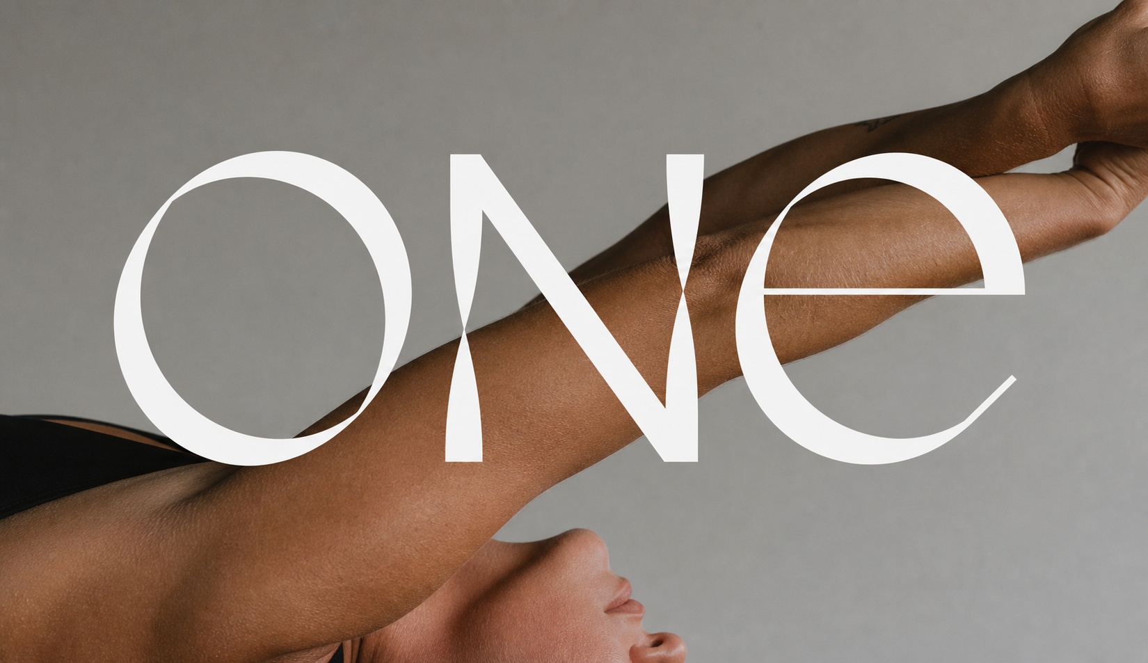 ONE Pilates campaign image with oversized ONE lettering